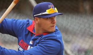 The Cubs' Javier Baez eyes a ball in batting practice during the media workout at Principal Park in Des Moines, Iowa on Wednesday, April 2, 2014.