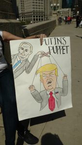 tax march chicago trump putin