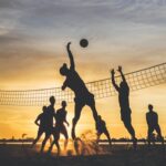 beach volleyball sunset silhouette