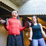 working-out-dumbbells-exercising-fitness