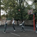 prison inmates playing basketball